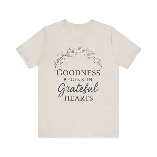 Goodness Begins in Grateful Hearts — Minimal Text Graphic Tee